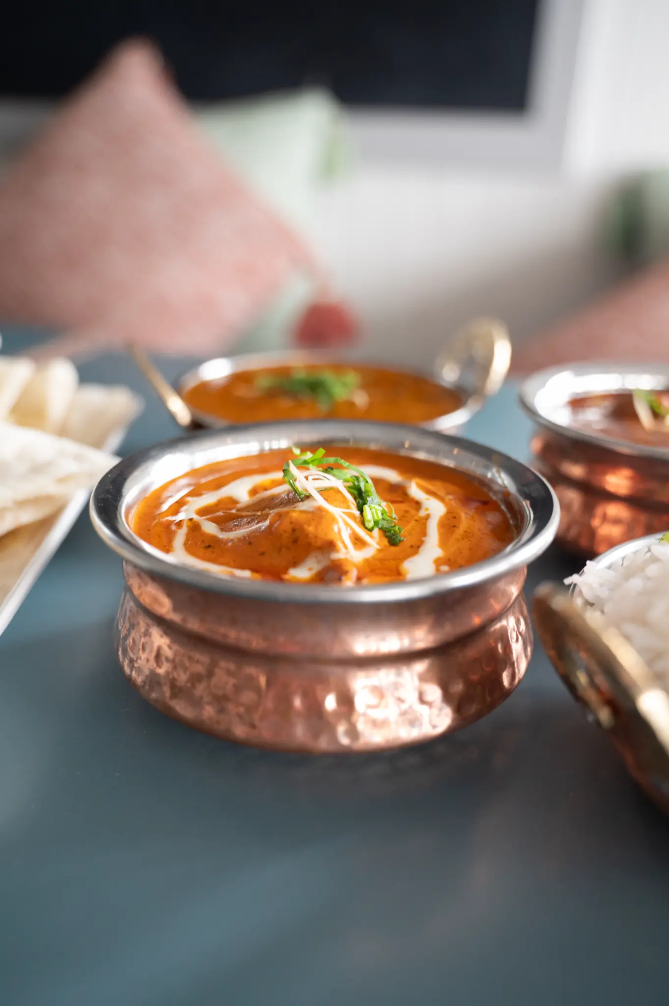 Butter chicken in a copper bowl — Bombay at Bucklands